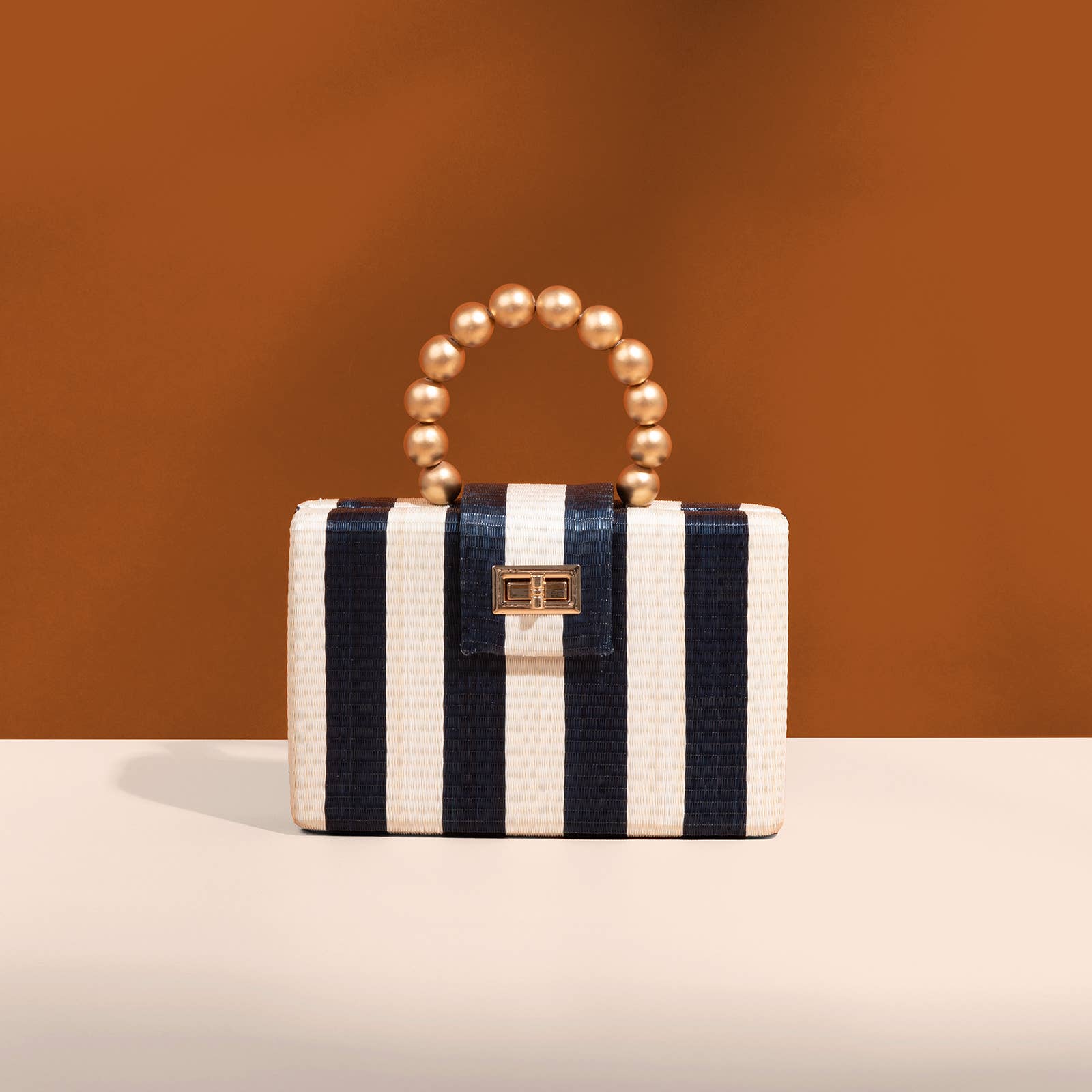 Navy Stripe Clutch | Gold Bead Handle | Summer Resort 2025